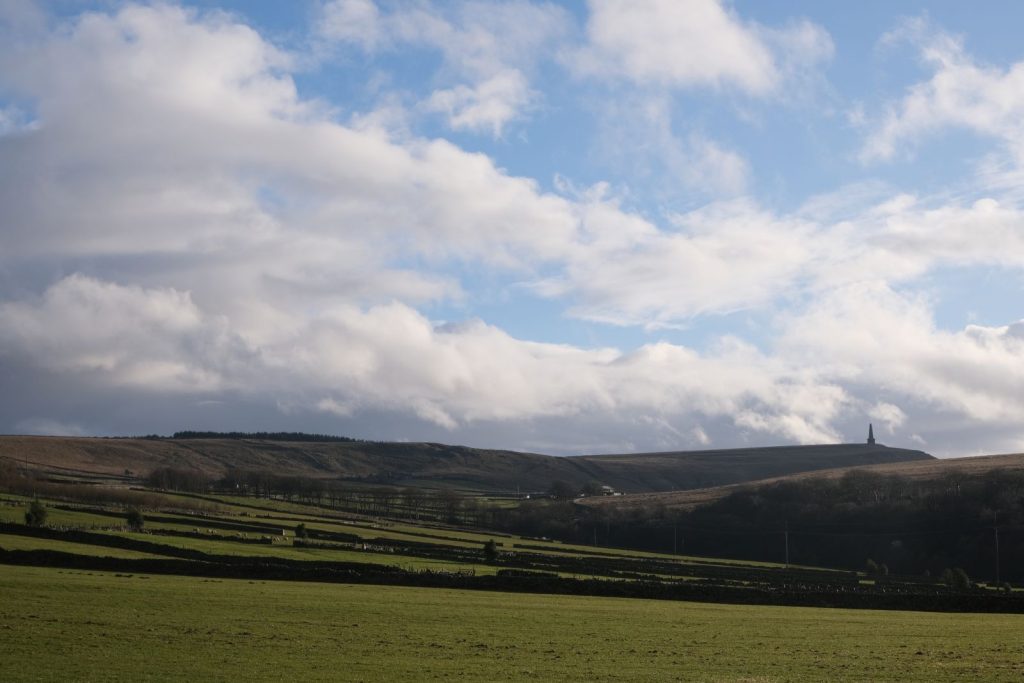 A photograph of Erringden Moor showing Stoodly Pike in the background.